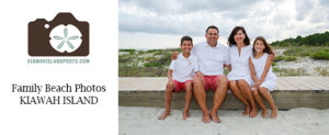 family of four posing on a boardwalk for family beach photos kiawah island
