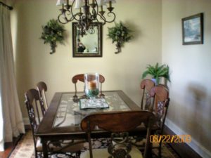 Before photos of dining room from real estate website bad lighting