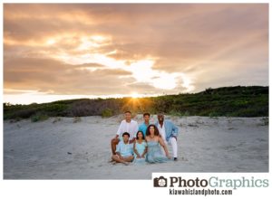 family of six on the beach at sunset on Kiawah Island in South Carolina