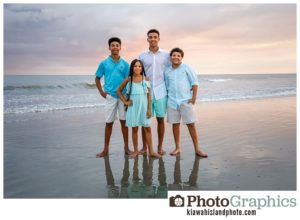 four kids on the beach at sunset during golden hour on kiawah island
